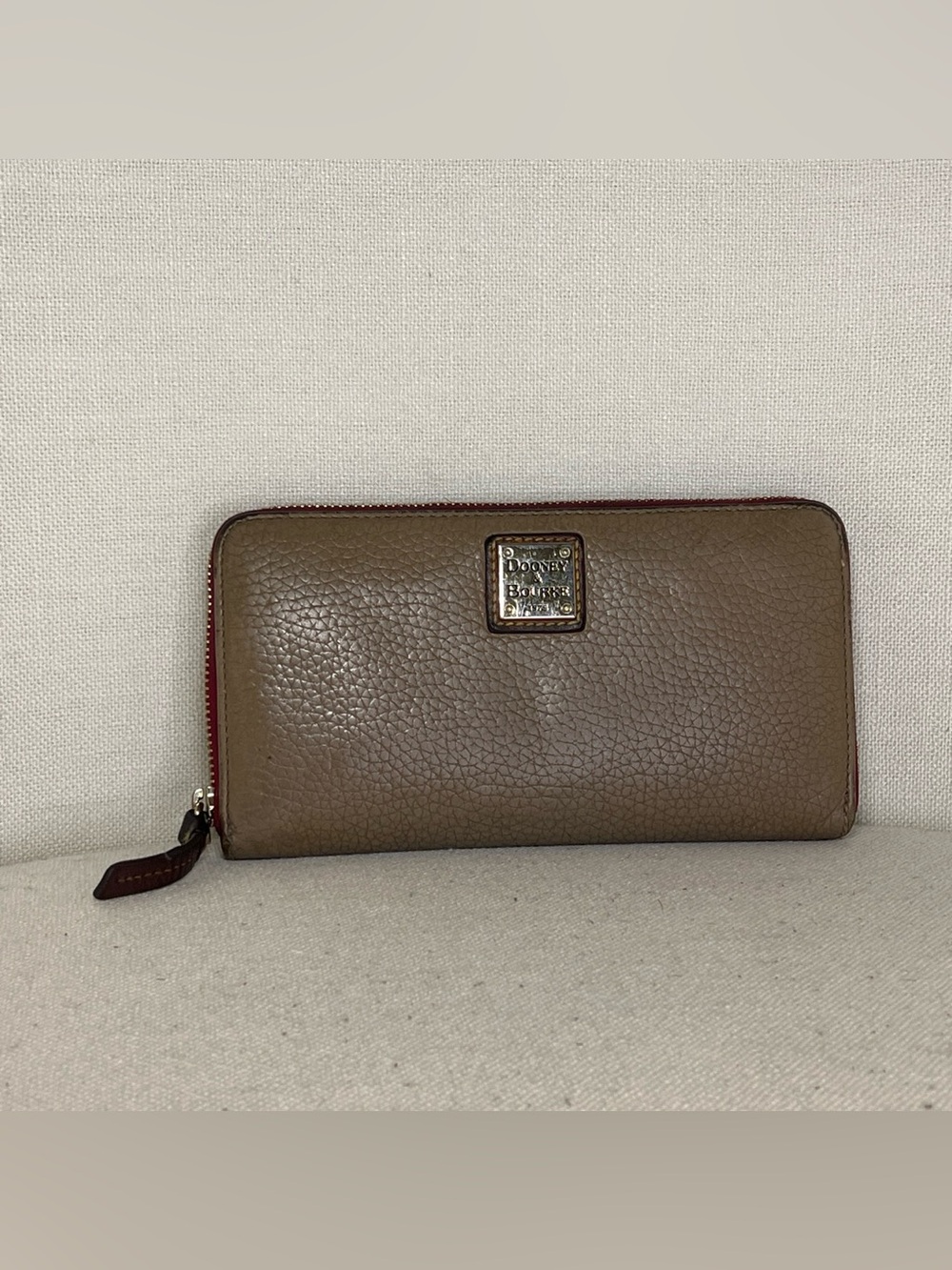 Dooney & Bourke Brown Leather Zip Wallet with Red Trim